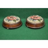 Pair of Victorian circular walnut foot stools having embroidered tops of flower heads,