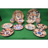 Group of six Imari plates together with two dishes,