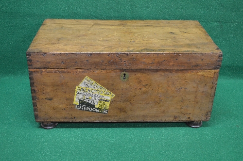 Camphor wood chest the top lifting to reveal storage space and having brass side carrying handles