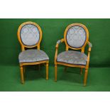 Set of ten 20th century beech framed chairs to comprise eight standard and two carvers having oval