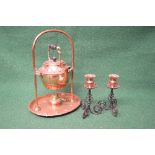Brass and copper Arts & Crafts spirit kettle on stand together with a pair of candle sticks having