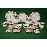 Royal Albert Old Country Roses tea and part dinner service to comprise: two teapots, two milk jugs,
