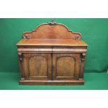 Victorian mahogany sideboard having raised back over two drawers and two arched panelled doors