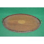 Oval mahogany serving tray having central inlaid panel of a sea shell with raised gallery and two