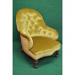 Victorian button back nursing armchair having arched back over padded seat with shaped front and