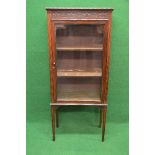 Mahogany glazed display cabinet having single glazed door opening to reveal two fixed shelves,