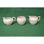 Belleek cream jug having shell decorated border and a green back stamp together with a Belleek
