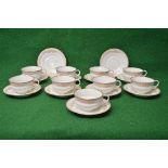 Possibly Continental porcelain set of nine tea cups and saucers together with two spare saucers