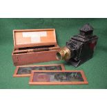 Magic lantern project together with a box of colour slides