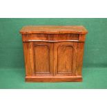 Victorian mahogany chiffonier the top having serpentine front over single drawer and two arched