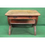 Oak centre table having rectangular top with rounded corners over single drawer with metal cup