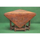 Oak carved drop leaf corner table the top having carved decoration of baskets of flowers with a