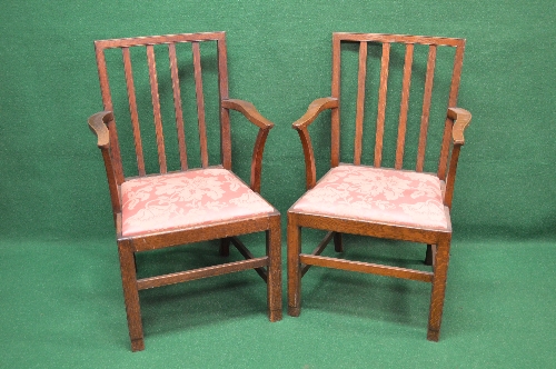 Set of six oak Georgian style armchairs having vertical back rails supported by moulded uprights