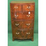 Mahogany bow fronted chest of drawers having two short drawers over three long graduated drawers
