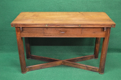 Mahogany fold over dining table the top having two fold over leaves with military style hinges over