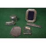 Group of silver and white metal items to compise: two glass silver topped dressing table pots,