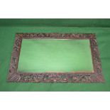 Oak carved wall mirror the frame having scrolled carved decoration - 52" x 32"