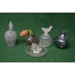 Group of glassware to include: three scent bottles, iridescent signed glass vase,