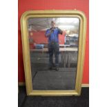 Gilt framed overmantle mirror having moulded frame with rounded top corners - 39.