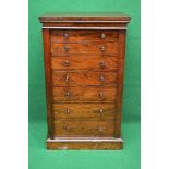 19th century mahogany Wellington chest of seven long graduated drawers with turned knob handles,