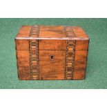 Walnut and inlaid tea caddy the lid opening to reveal two lidded tea compartments with turned