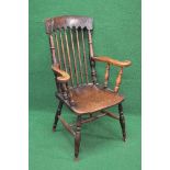 Victorian Windsor chair having carved top rail supported by turned spindles and uprights leading to