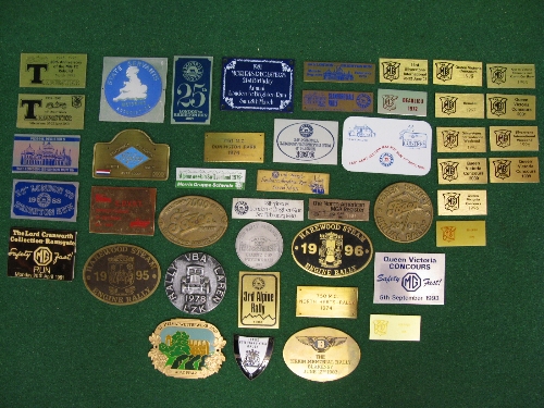 Quantity of brass, plastic, cast and enamel rally plaques from around the world Please note