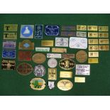Quantity of brass, plastic, cast and enamel rally plaques from around the world Please note