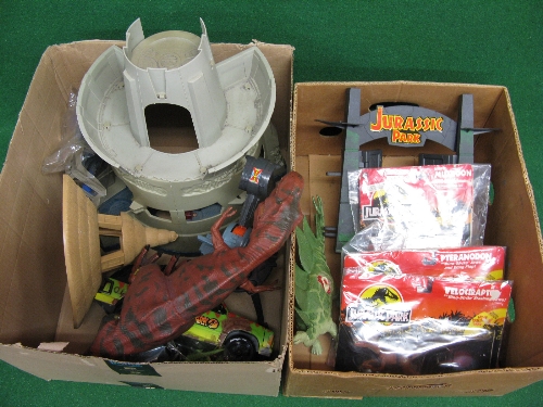 Two boxes of 1990's Jurassic Park plastic items to include: dinosaurs, structures, Jeep, accessories