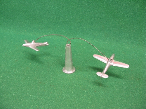 Two removable WWII fighter planes (wingspan 5.5") which balance and rotate on a central tower,