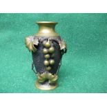 Oriental bronze vase having applied raised decoration of grapes and grape vines on a textured