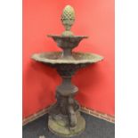 Fibreglass and cement mix two tier water fountain having pineapple formed top over two graduated