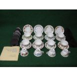 Set of twelve Franklin porcelain floral decorated tea cups and saucers with stands Please note