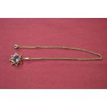 9ct gold and Amethyst single stone pendant in a star shaped design, claw set with a circular cut