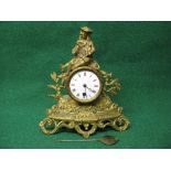 Gilt metal figural mantle clock having white enamel dial with black Roman Numerals and pierced black