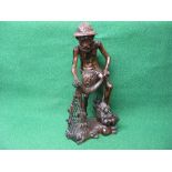 Hardwood carved figure of a fisherman pulling his nets and catch from the water - 19.75" tall Please