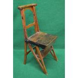 Set of oak four step metamorphic library steps folding into a chair with shaped back rail and