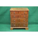 19th century mahogany chest of drawers having cross banded top over four graduated drawers with