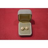 Pair of 18ct gold Diamond and cultured pearl cluster ear studs Please note descriptions are not