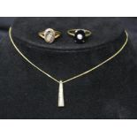 9ct gold pendant on chain together with a 9ct gold ring (af) and an 18ct gold ring Please note