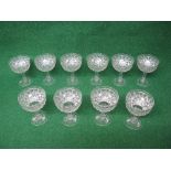 Set of ten Tudor Crystal champagne coupes having cut decorated bowls supported on cut stems and star