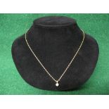 18ct gold pendant set with single diamond in a claw setting on a 9ct oval link chain - 20.25" (gross