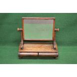 Mahogany swing frame toilet mirror having two drawer base and standing on turned bun feet - 22.75"
