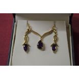 9ct gold and Amethyst single stone pendant necklace, claw set with a drop shaped Amethyst together
