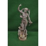 Weathered metal figure of a lady standing on a two wheeled chariot - 39" tall Please note