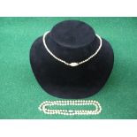 Cultured pearl necklace formed of single row of uniform sized pearls having 9ct white gold clasp set