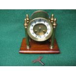 French 8 day mantle clock having cream dial with black numerals and pierced black hands, supported