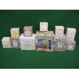 Eleven boxed items from the 1990's Enesco Cherished Teddies collection (descriptive list and extra