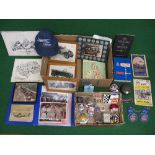 Two boxes of mixed automobilia and ephemera to include: badges, books, black and white pictures,