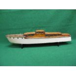 Large wooden model of a motor cruiser with large electric motor, two propshafts but only one